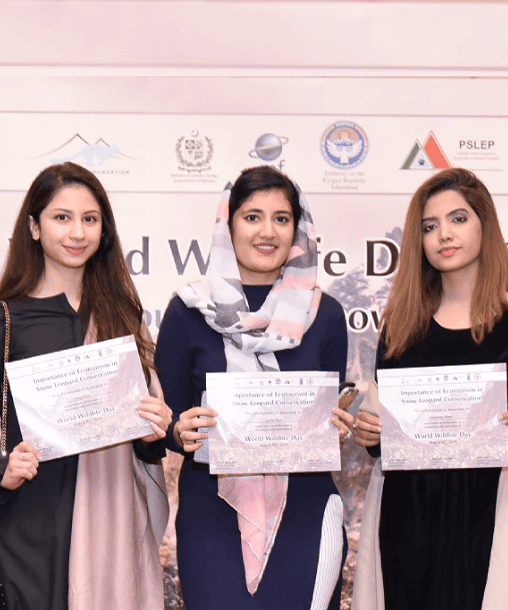 girls receiving certificate